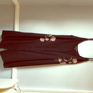 Black button down dress with floral embellishment